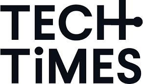 Black text logo reading "TECH TIMES" in bold capital letters, with a horizontal line extending from the "H" in "TECH" and dotting the "I" in "TIMES.